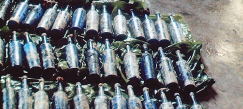 Cobalt blue bottles salvaged out of a single barrel on the Georgiana
