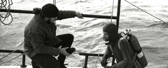 Captain Howard and Dr. Spence discussing the work on the Georgiana.