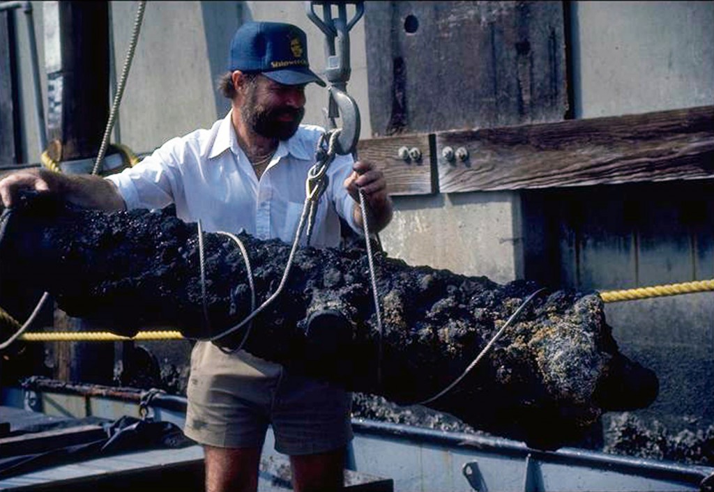 Dr. Spence unloading iron cannon found at Cape Romain. 1987 photo by Kevin Rooney courtesy Shipwrecks Inc.